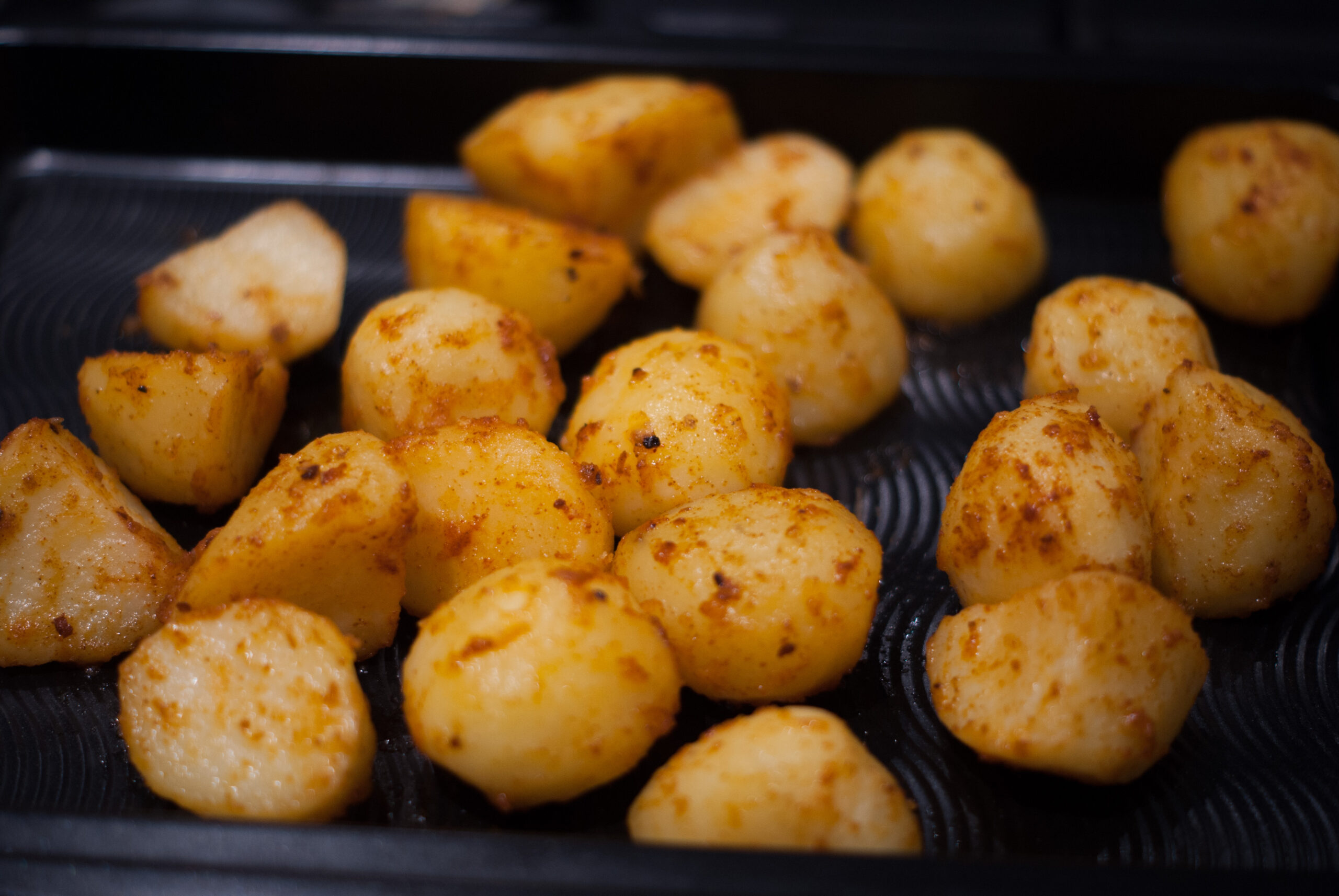 A Tray of spicy potatoes fresh from the oven